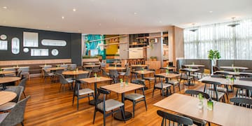 a room with tables and chairs