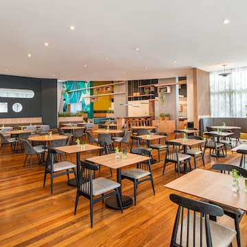 a room with tables and chairs