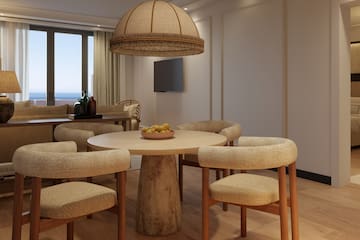 a room with a table and chairs