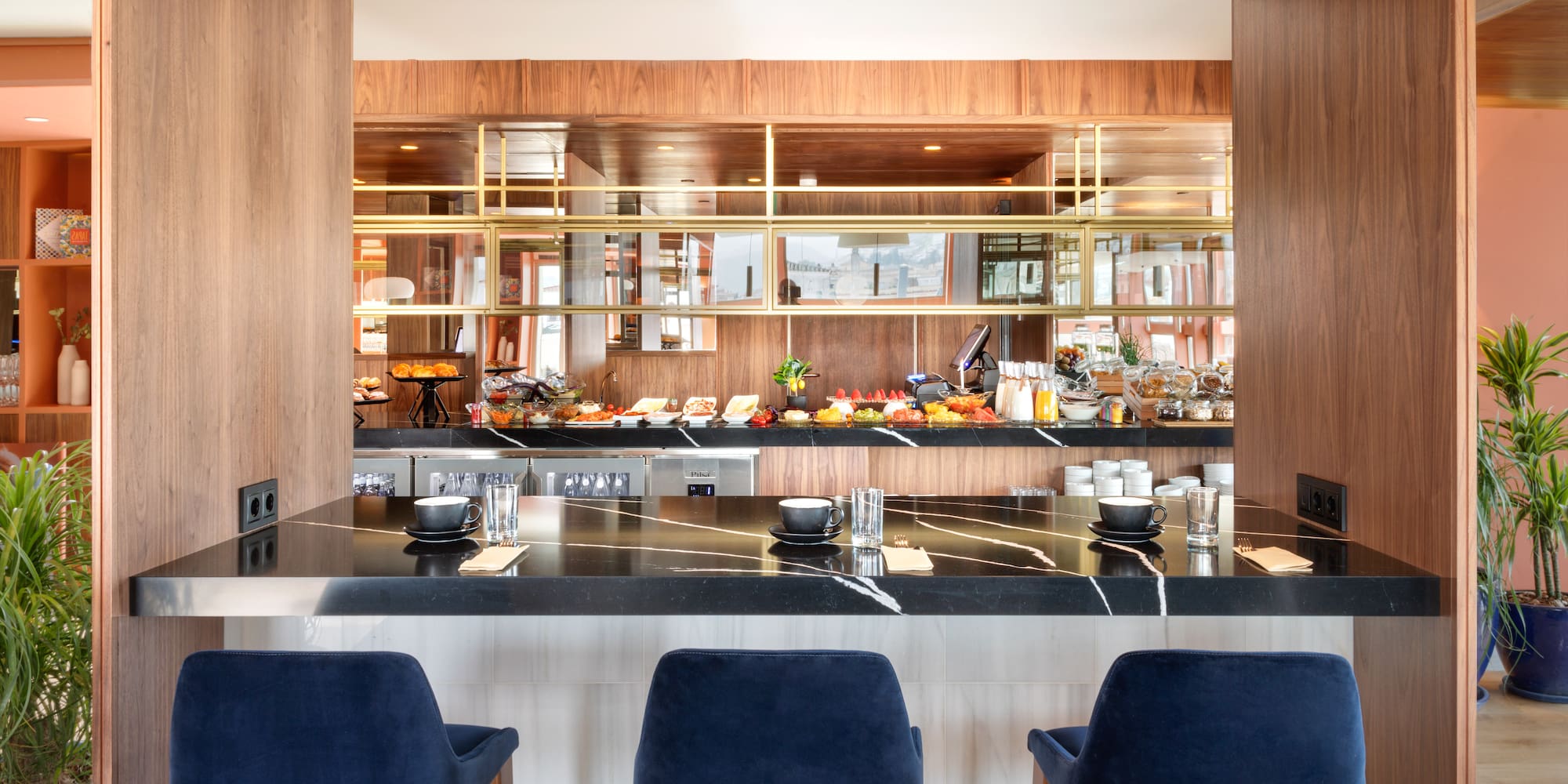 a restaurant with a counter and chairs