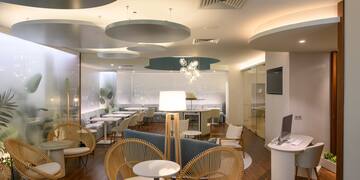 a room with tables and chairs