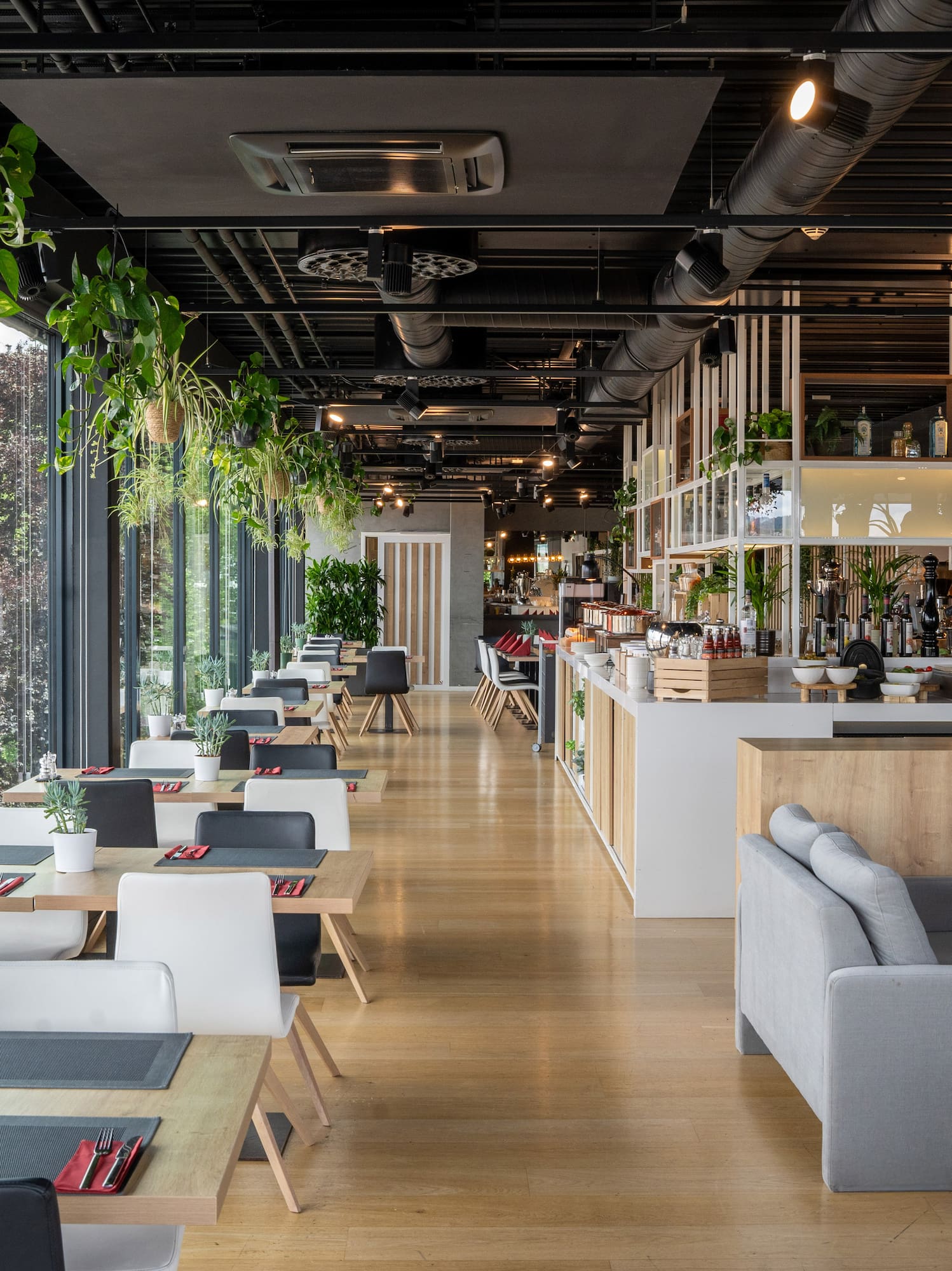 a restaurant with tables and chairs