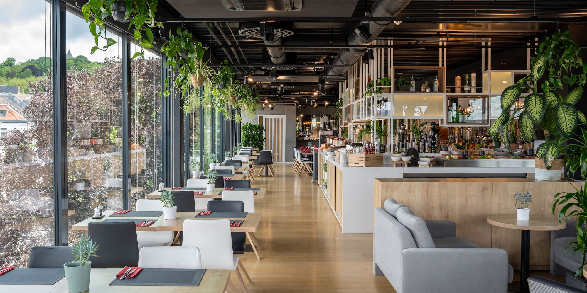 a restaurant with tables and chairs