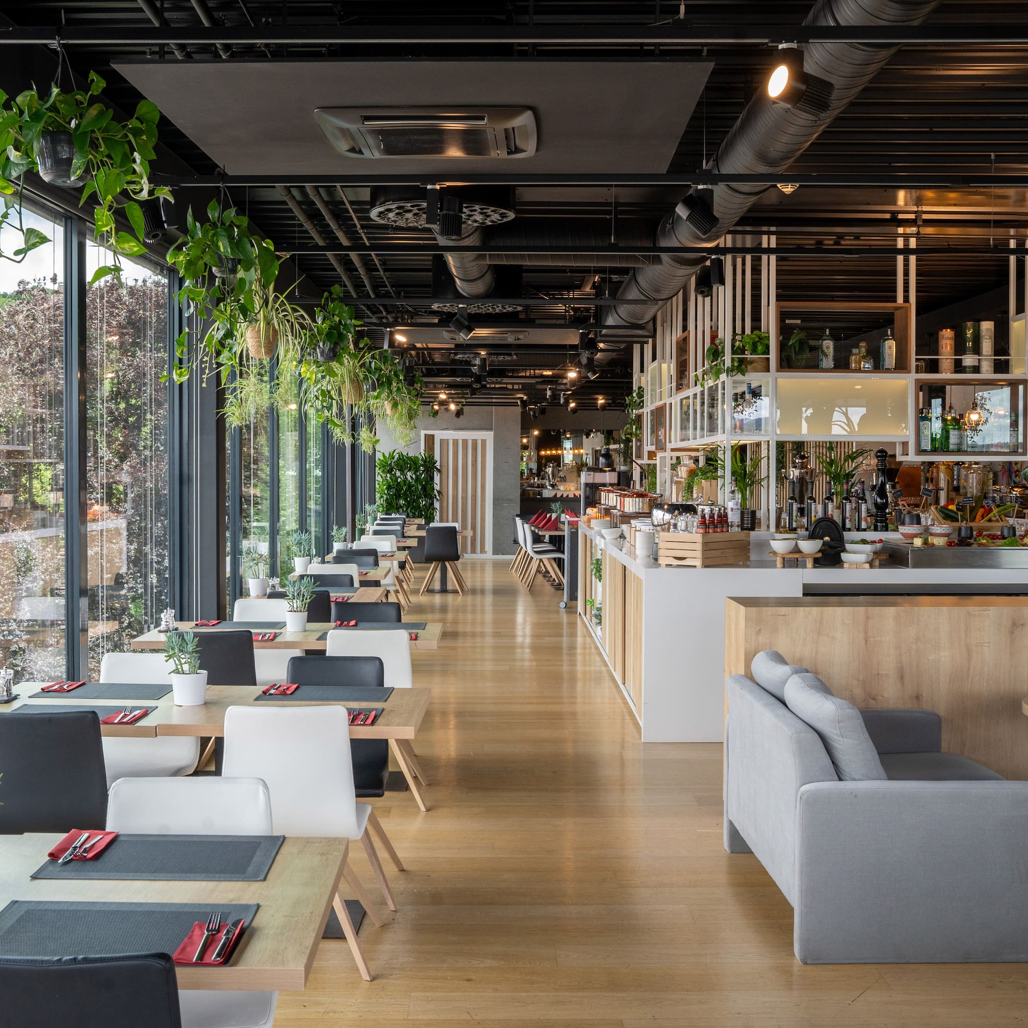 a restaurant with tables and chairs