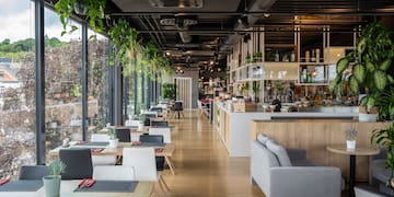 a restaurant with tables and chairs