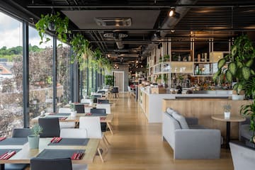 a restaurant with tables and chairs