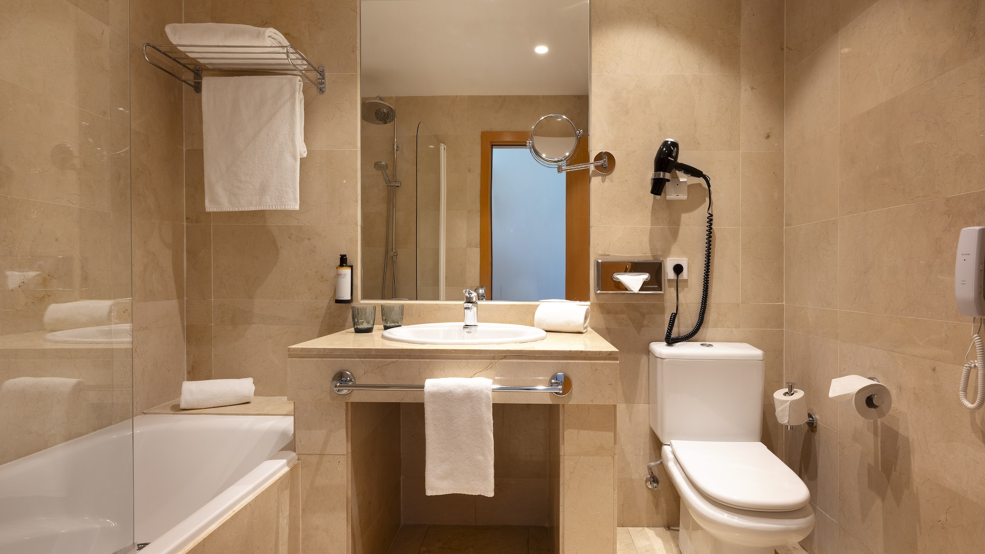 a bathroom with a sink toilet and bathtub