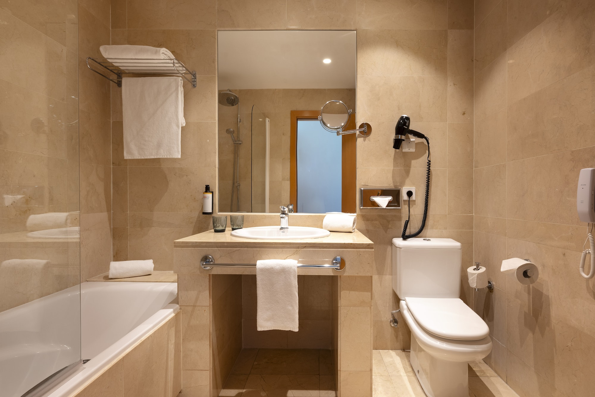 a bathroom with a sink toilet and bathtub