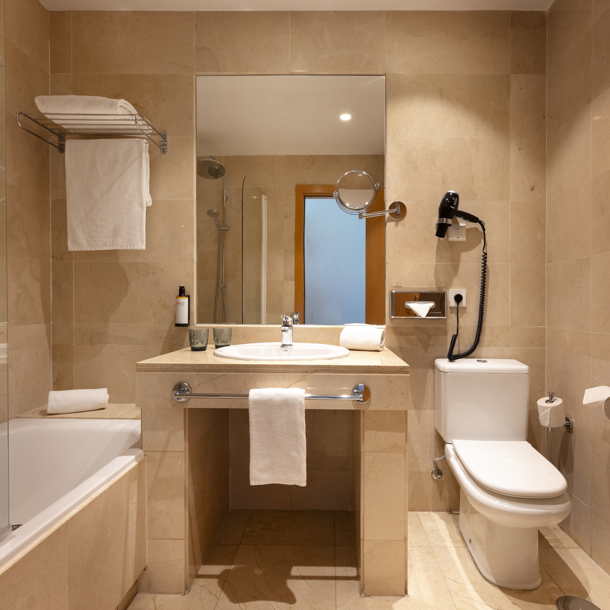 a bathroom with a sink toilet and bathtub