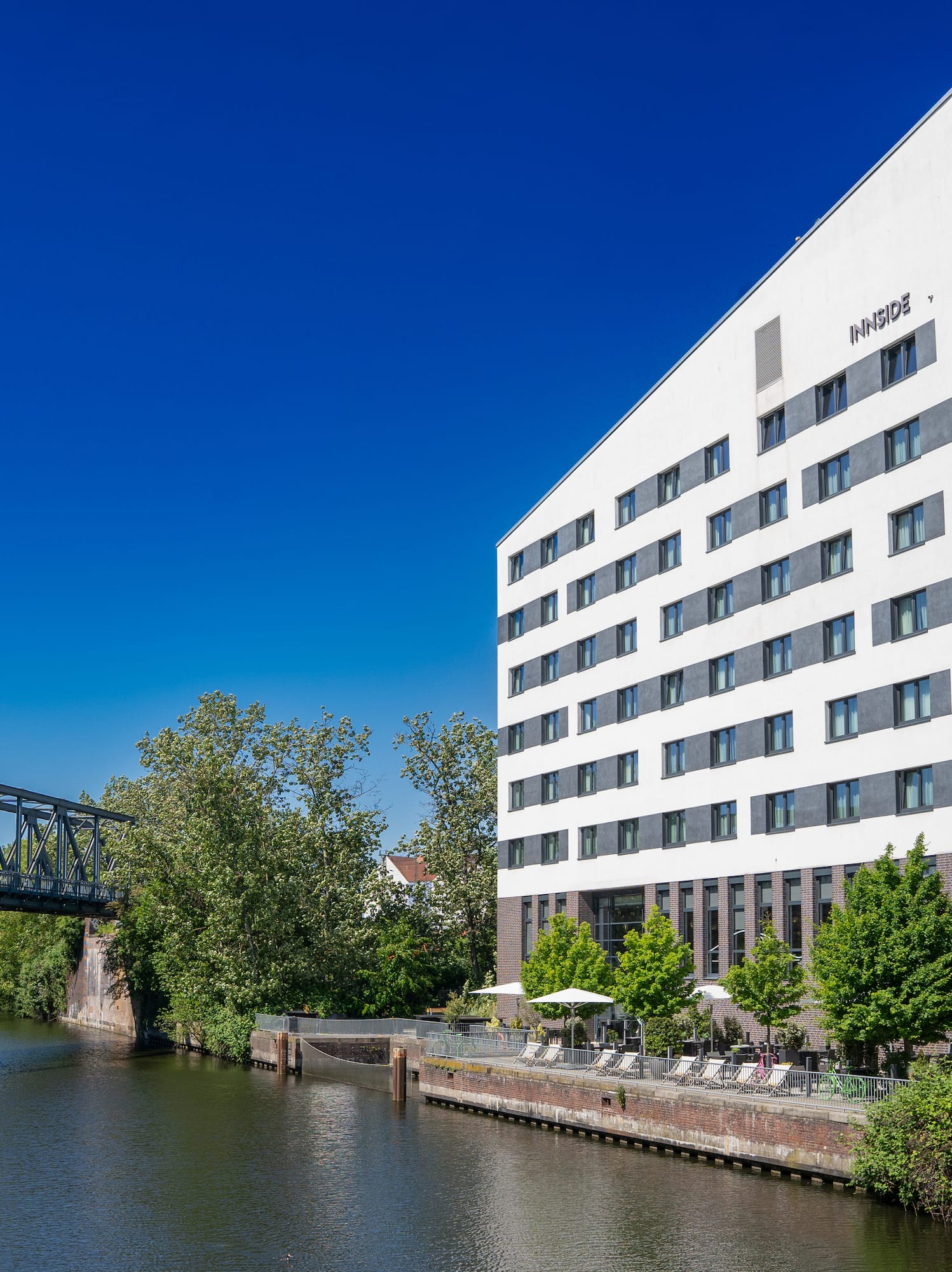 a building next to a river