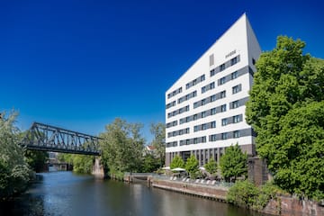 a building next to a river