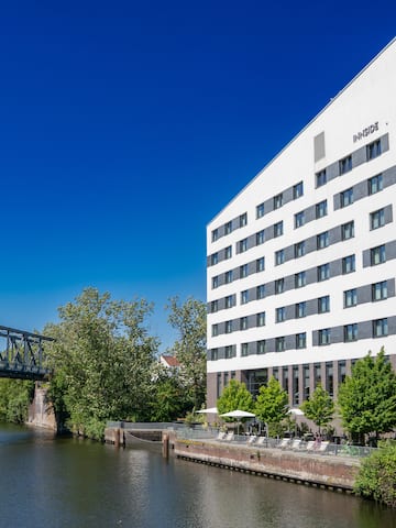 a building next to a river