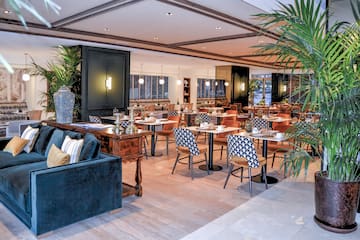 a room with tables and chairs