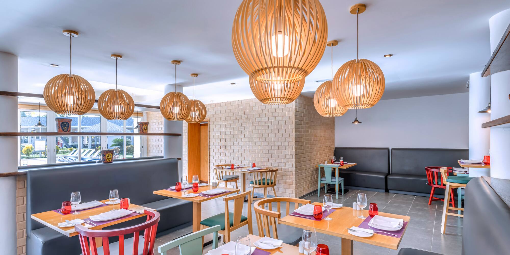 a restaurant with tables and chairs