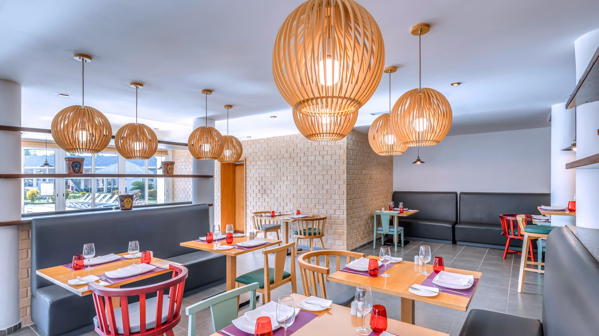 a restaurant with tables and chairs