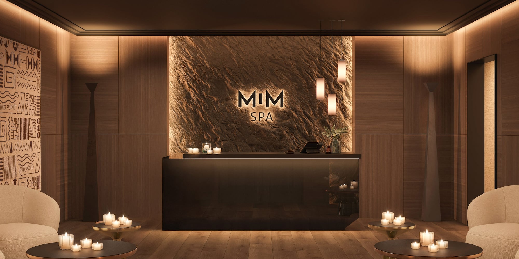 a reception area with candles on the wall