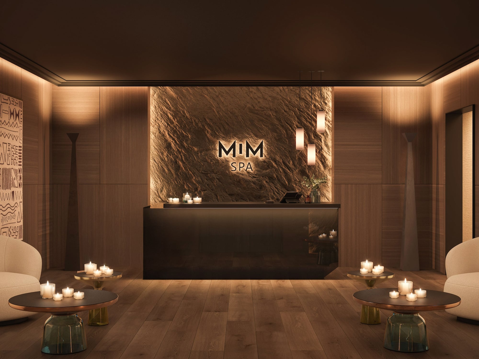 a reception area with candles on the wall