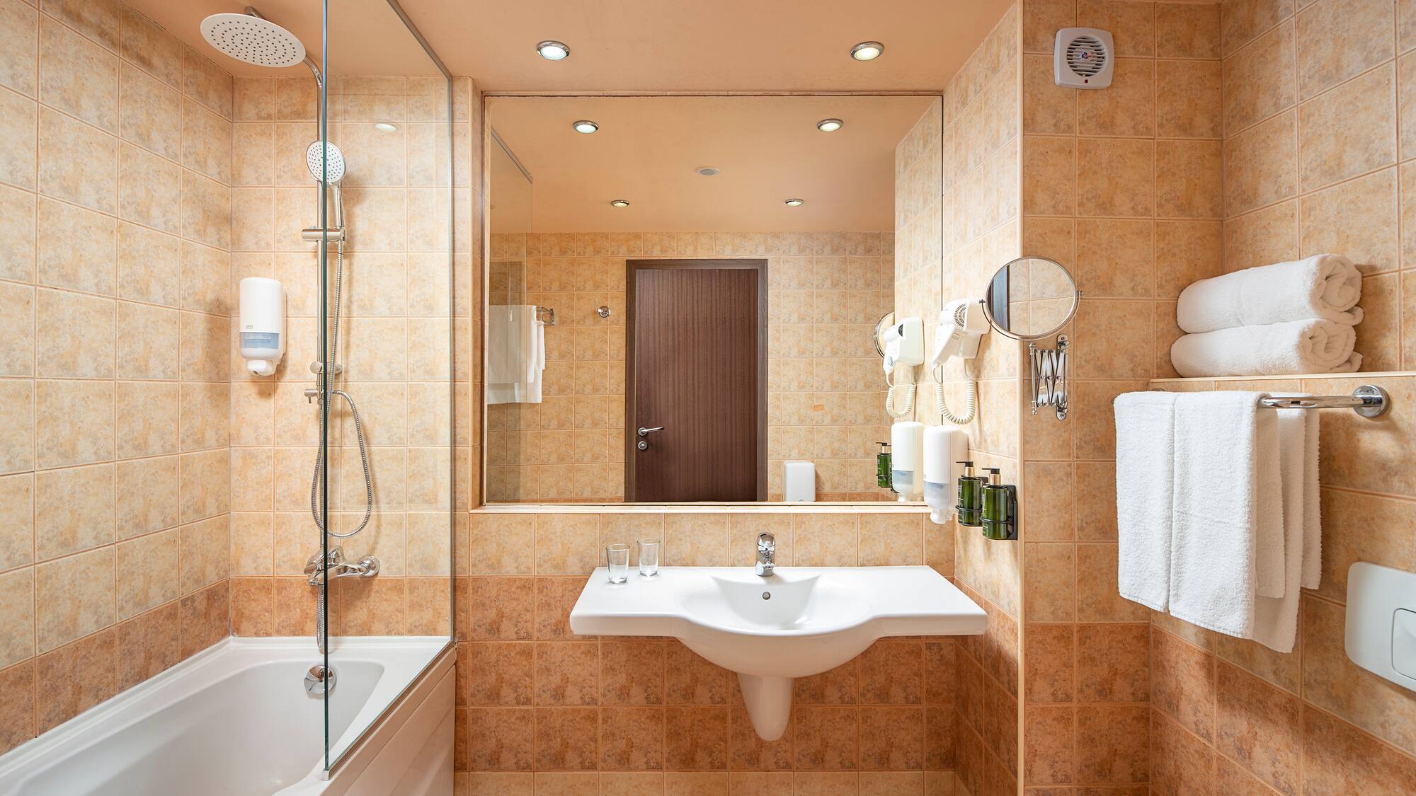 a bathroom with a sink and a shower