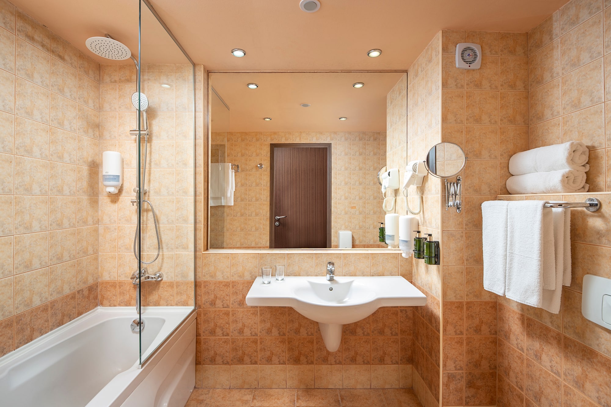 a bathroom with a sink and a shower