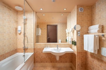 a bathroom with a sink and a shower