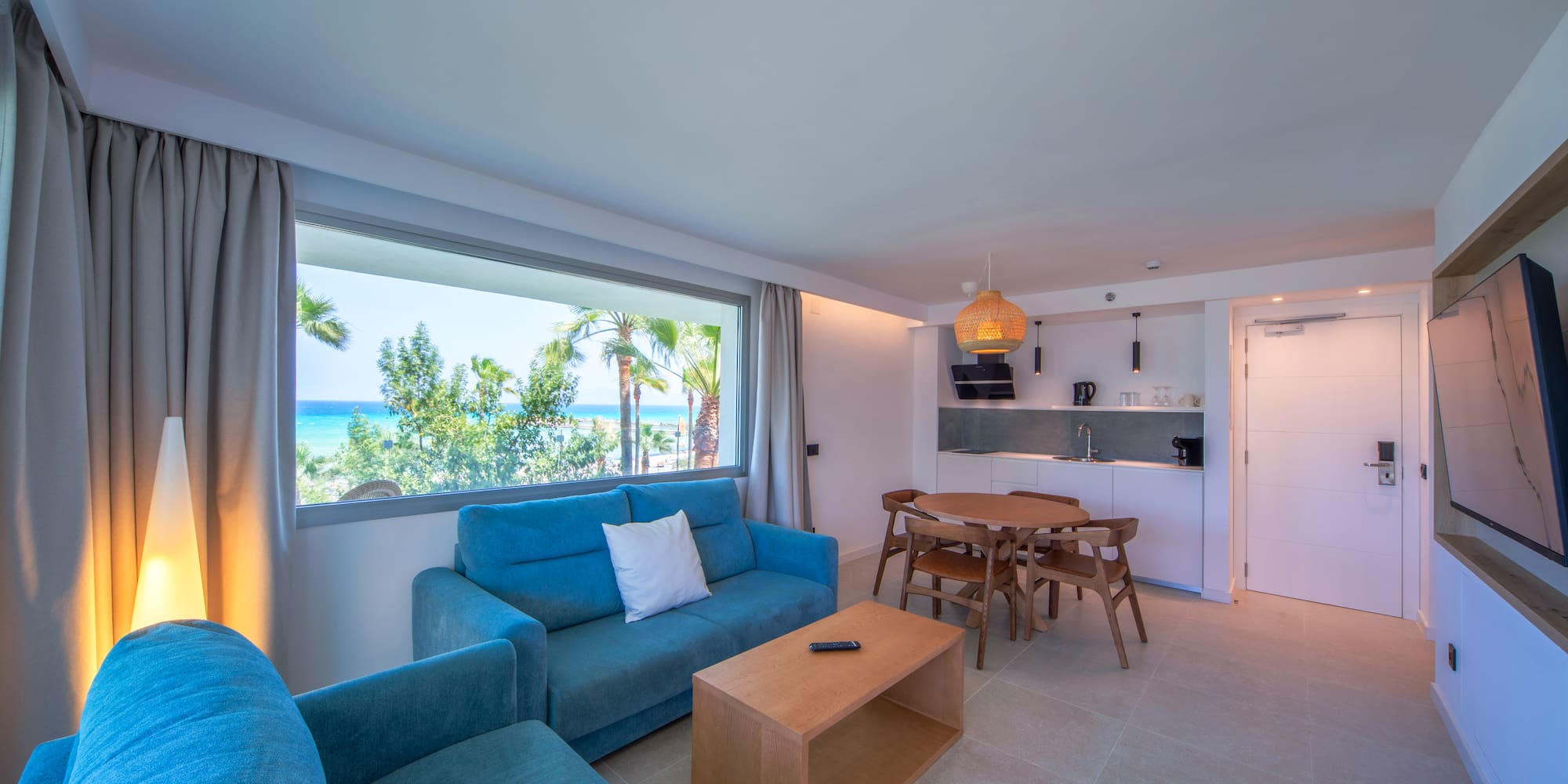 a living room with a table and couch