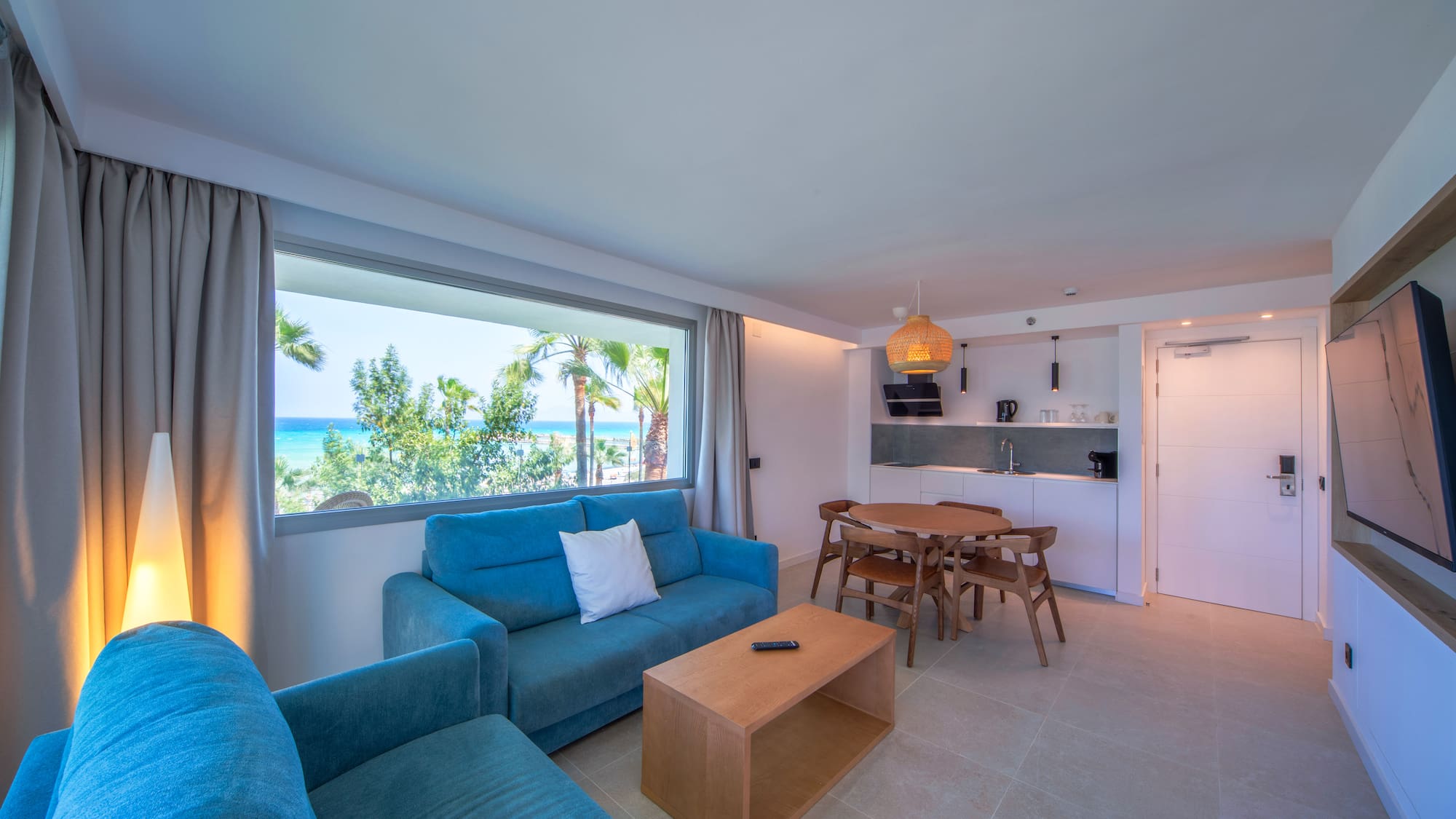 a living room with a table and couch