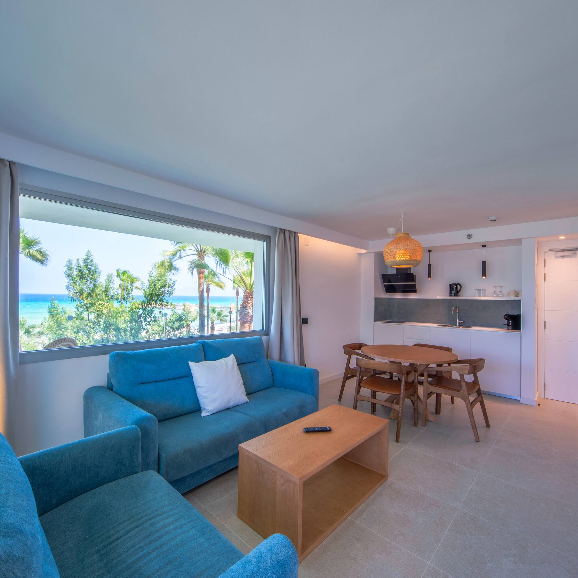a living room with a table and couch
