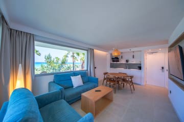 a living room with a table and couch