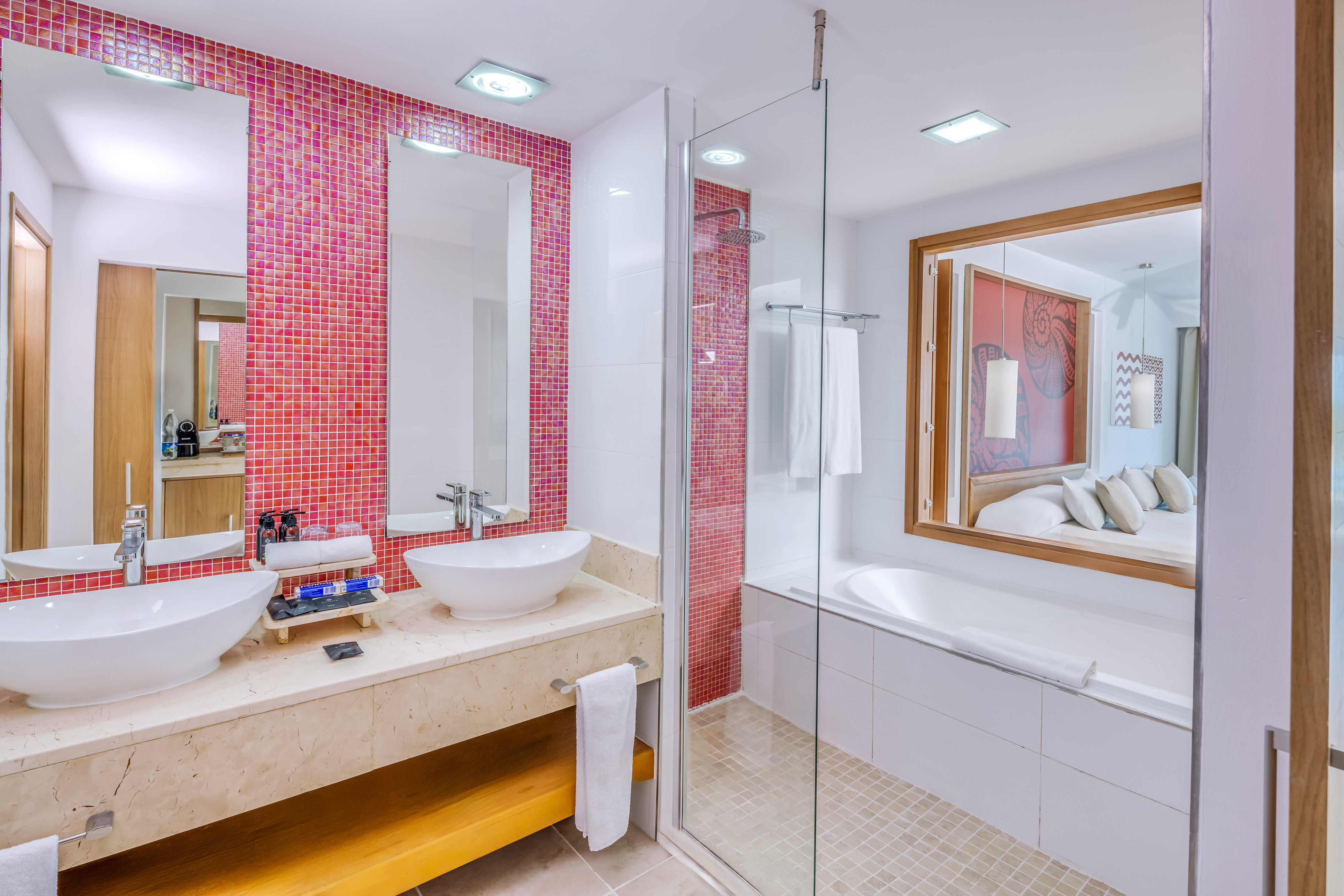 a bathroom with a shower and sink