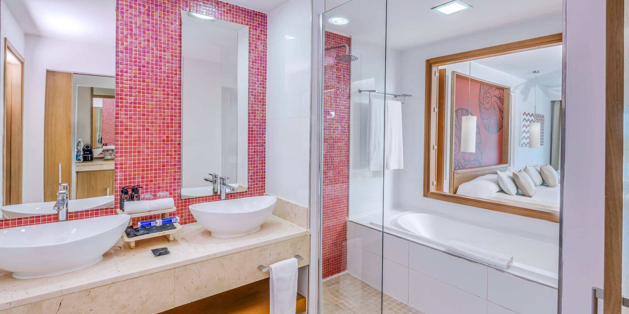 a bathroom with a shower and sink