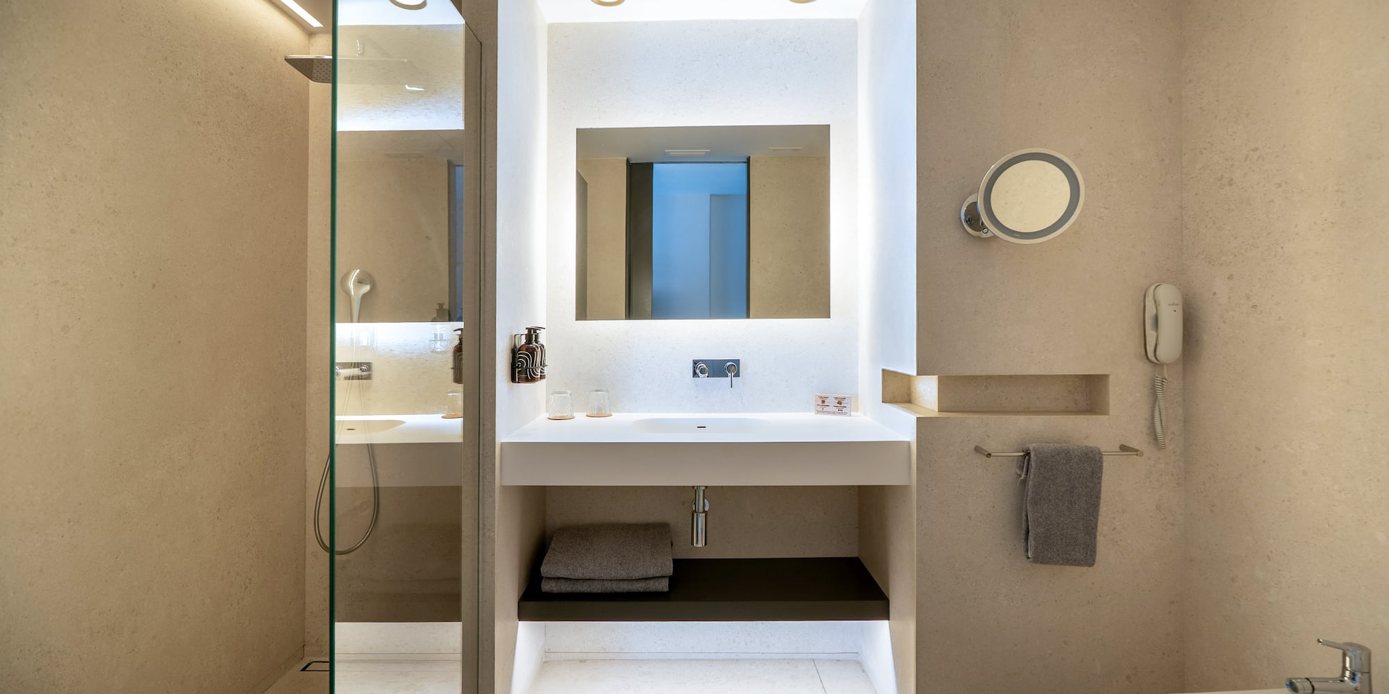 a bathroom with a sink and a shower