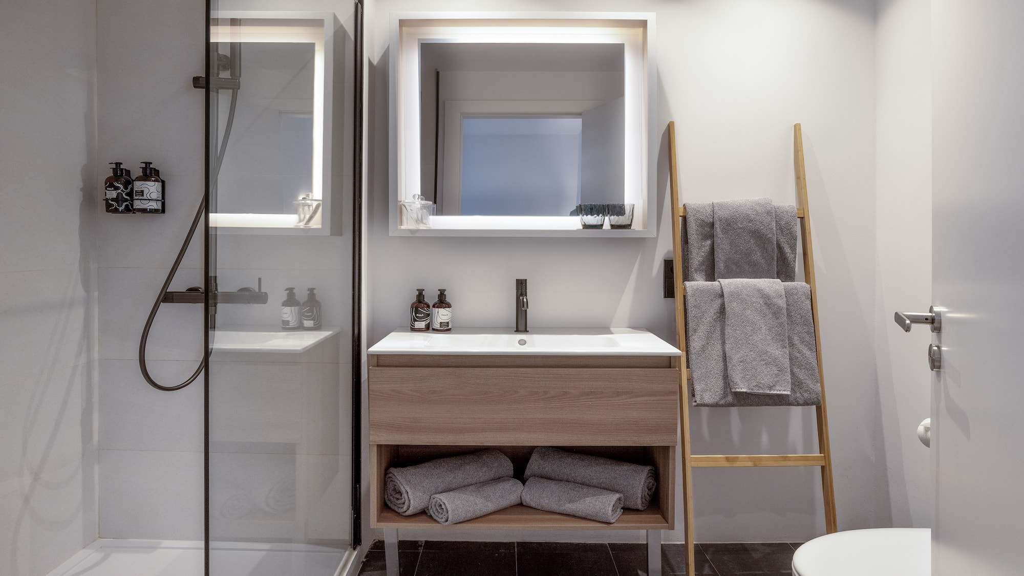 a bathroom with a mirror and sink