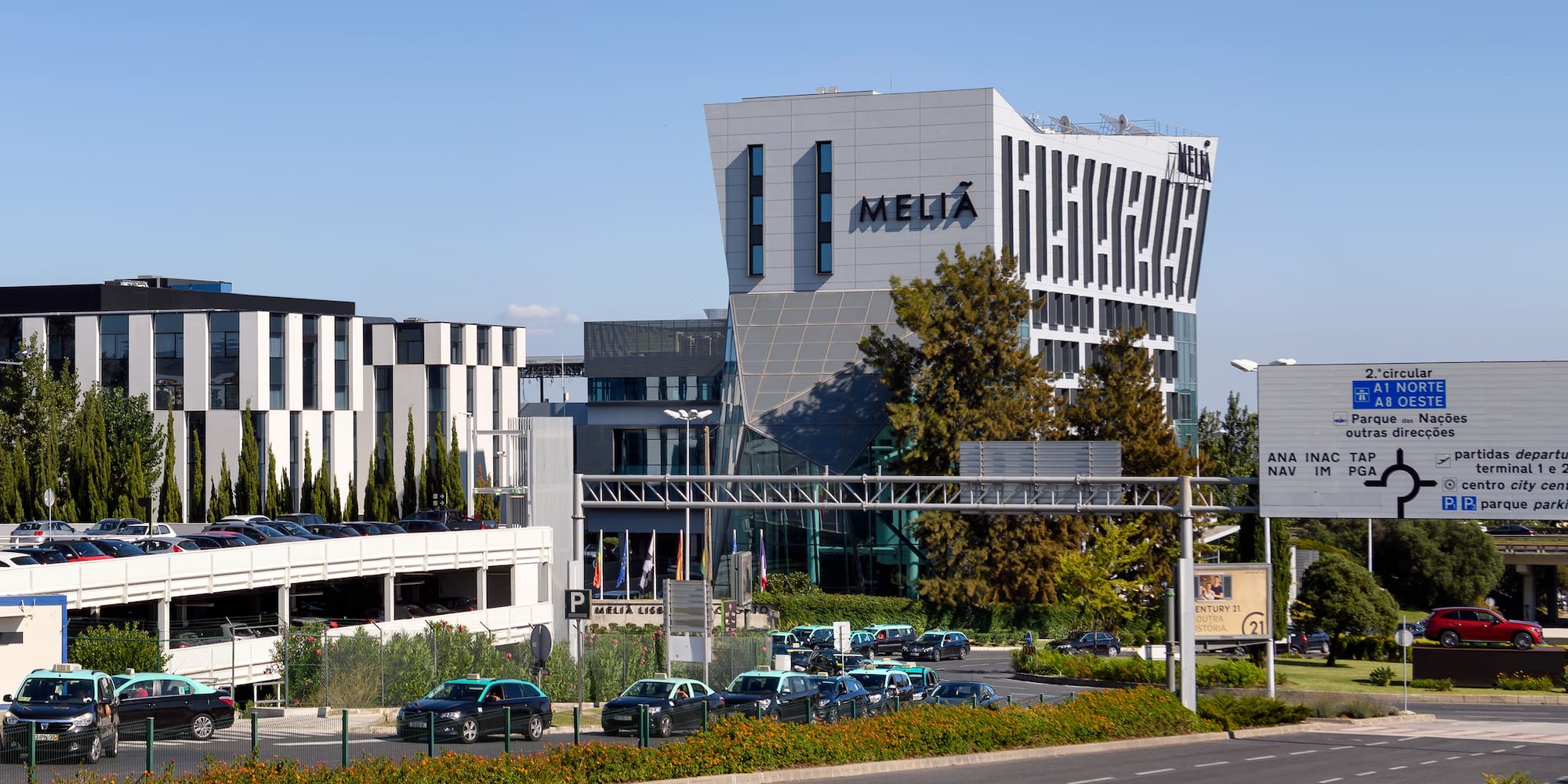 a building with cars parked on the side of it