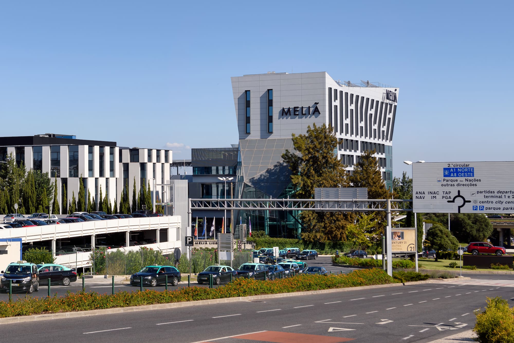 a building with cars parked on the side of it