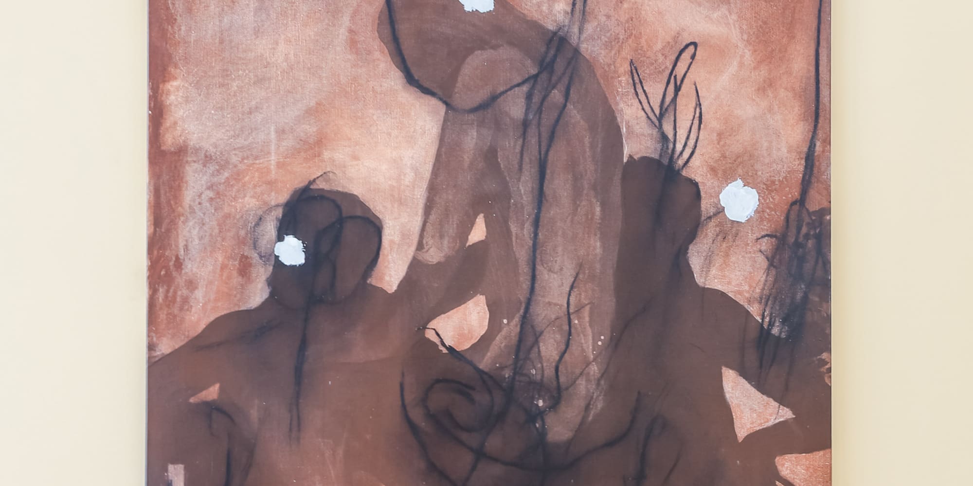 Abstract painting, dark figures on reddish-brown canvas with white highlights.