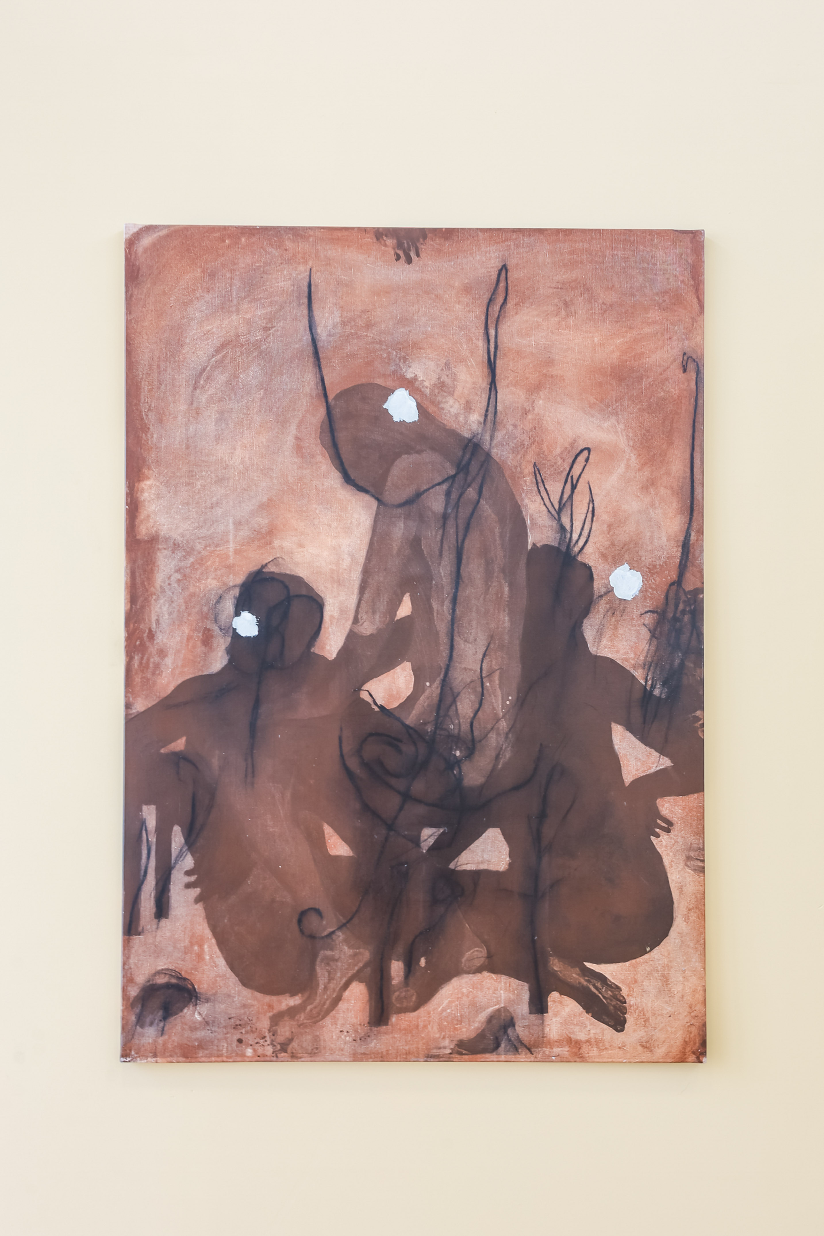 Abstract painting, dark figures on reddish-brown canvas with white highlights.