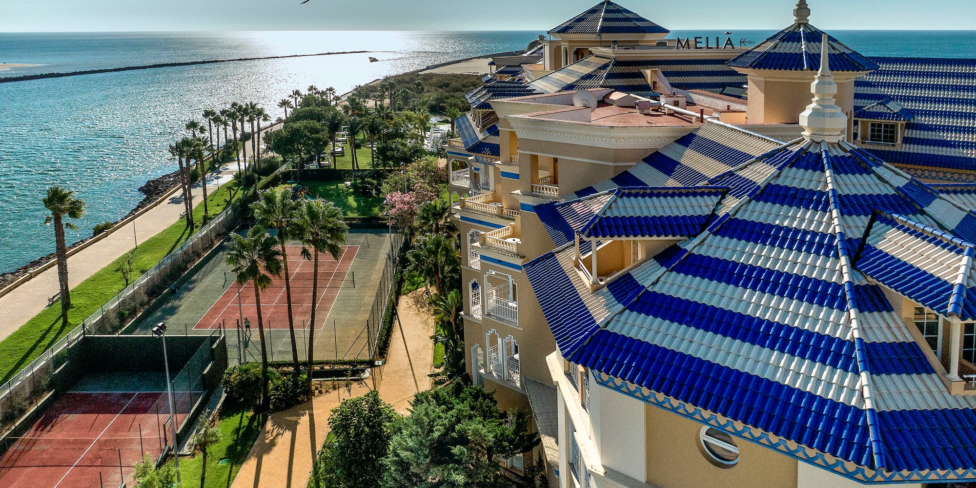 a bird's eye view of a beachfront hotel