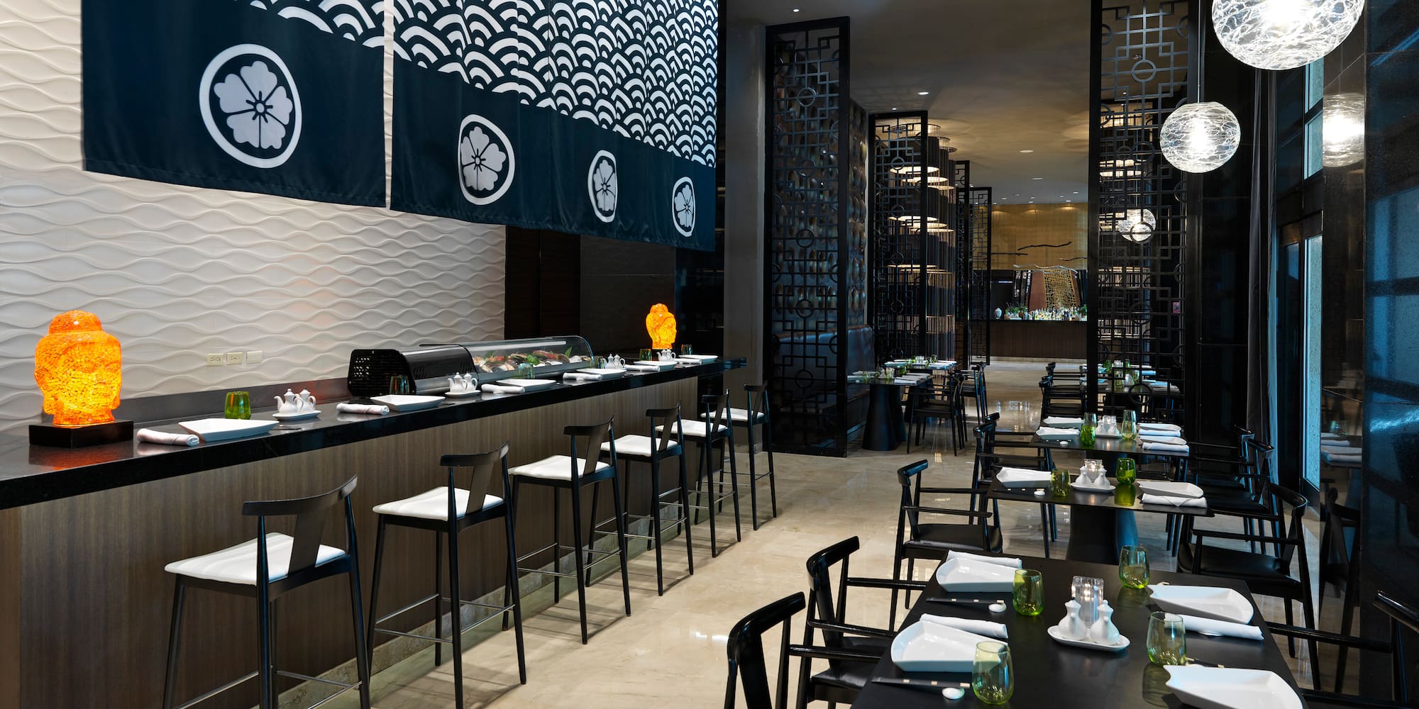 a restaurant with tables and chairs