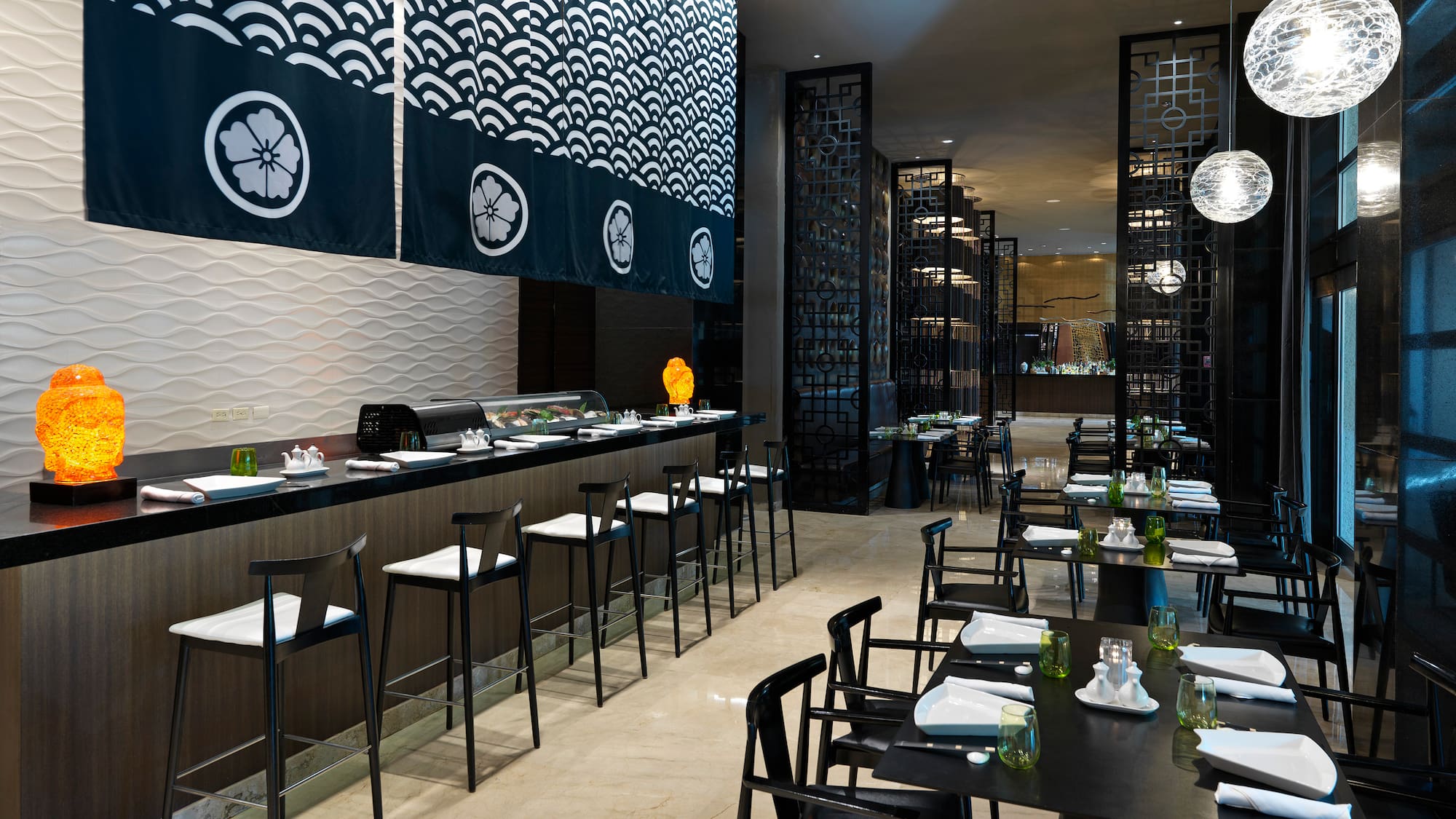 a restaurant with tables and chairs