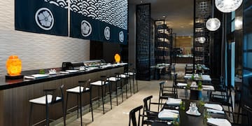 a restaurant with tables and chairs