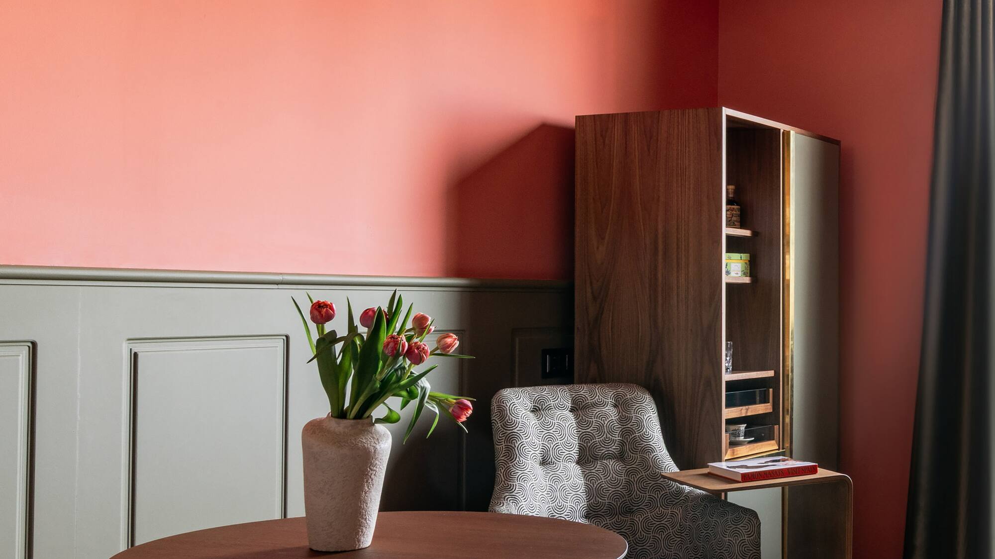 a room with a table and chairs