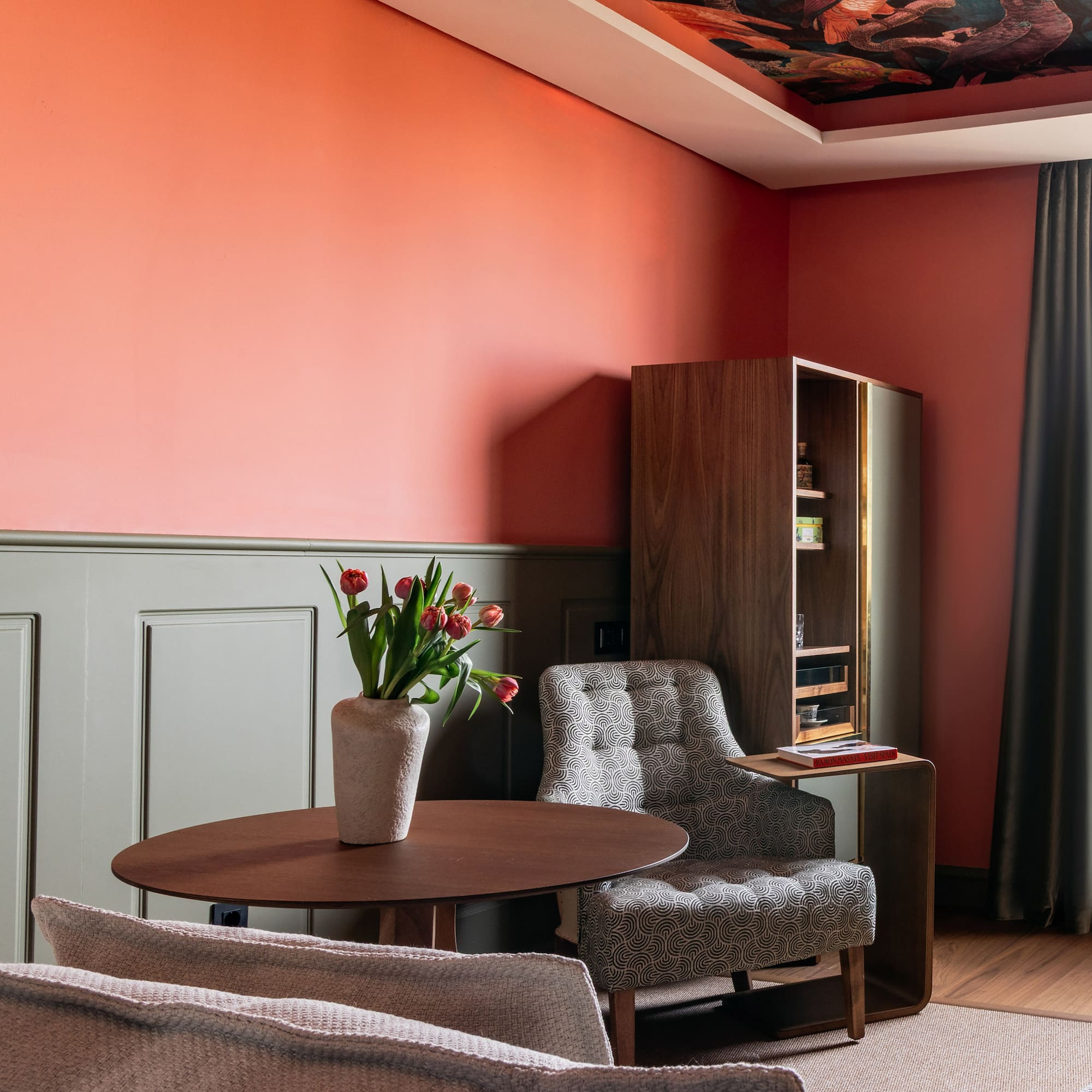 a room with a table and chairs