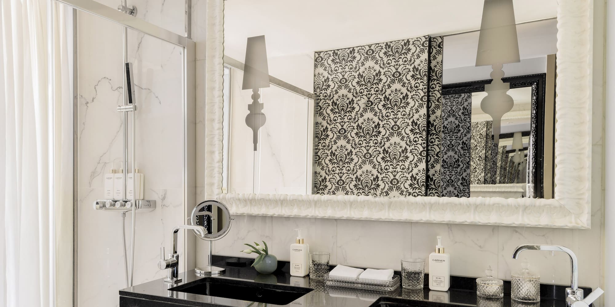 a bathroom with a mirror and a sink