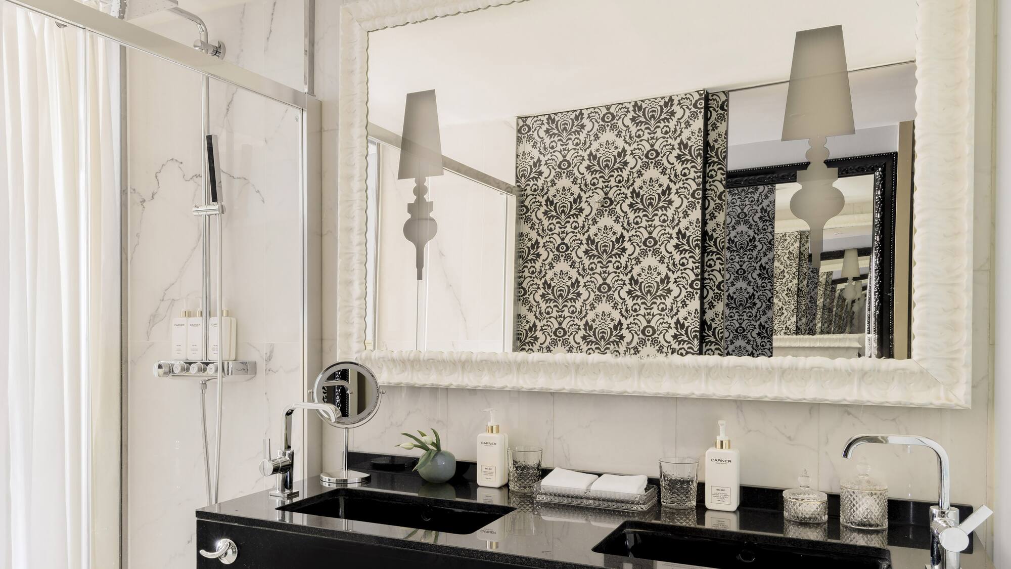 a bathroom with a mirror and a sink