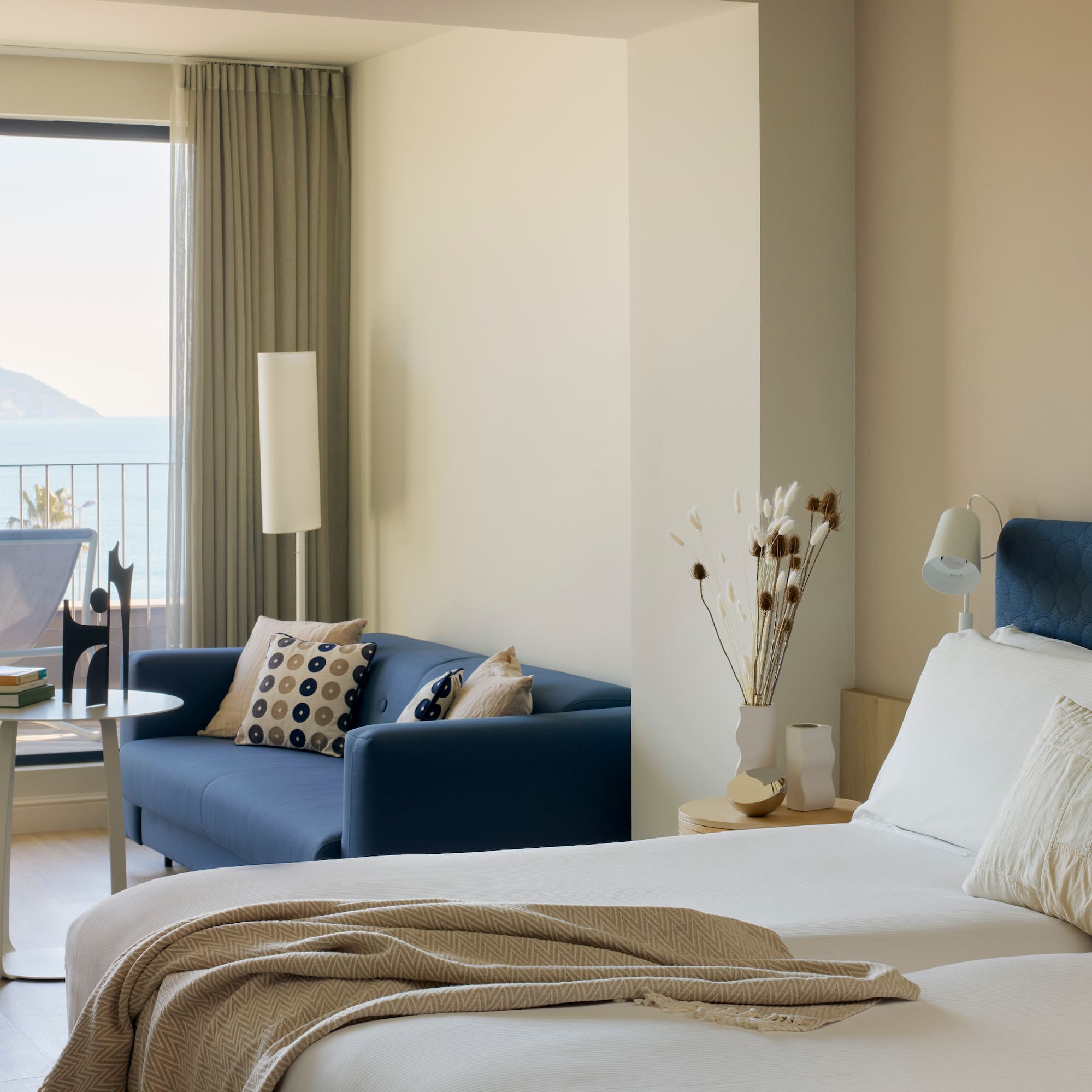 a room with a bed and a couch