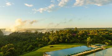 a pool surrounded by trees