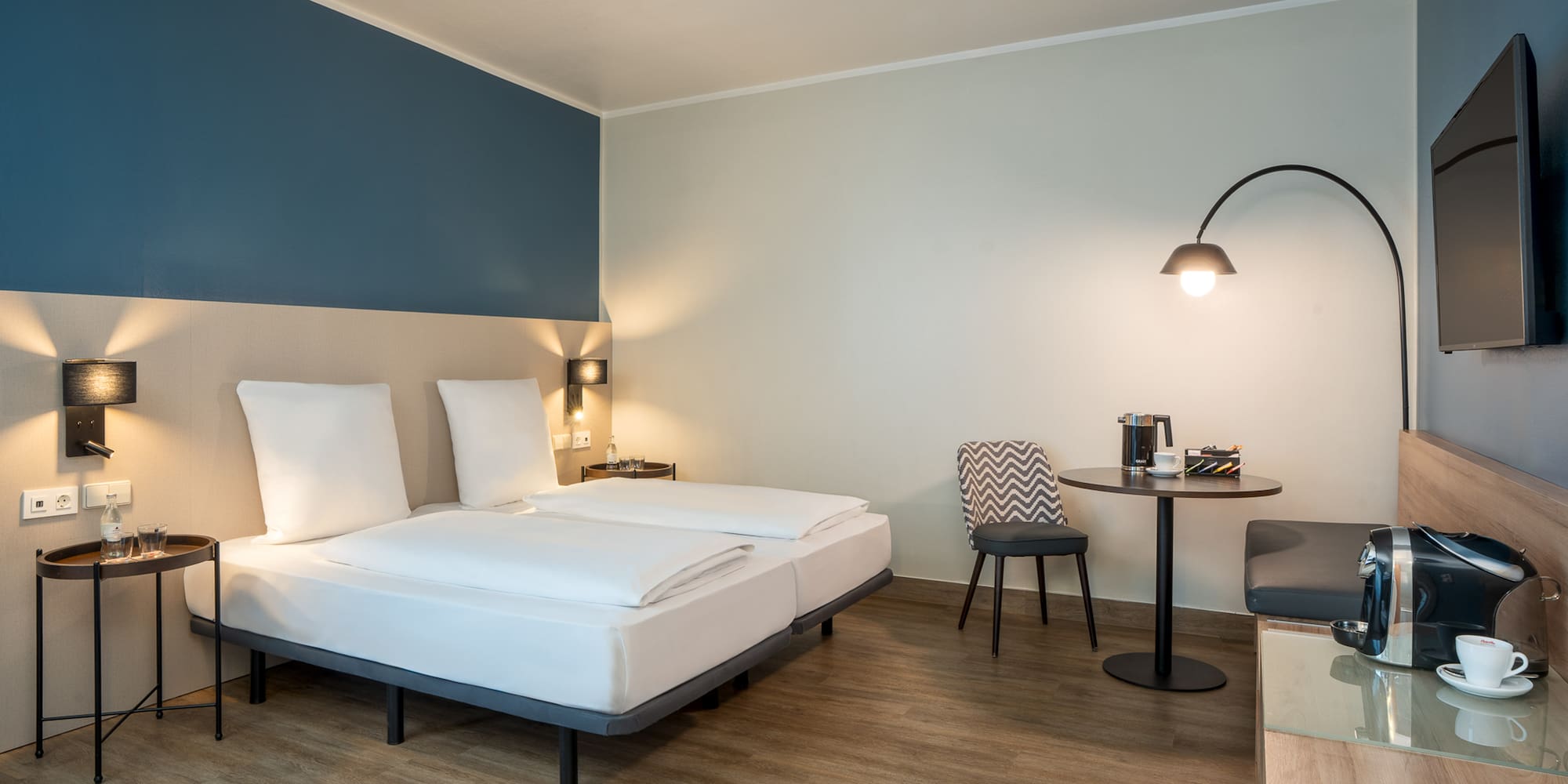 a room with a bed and a table