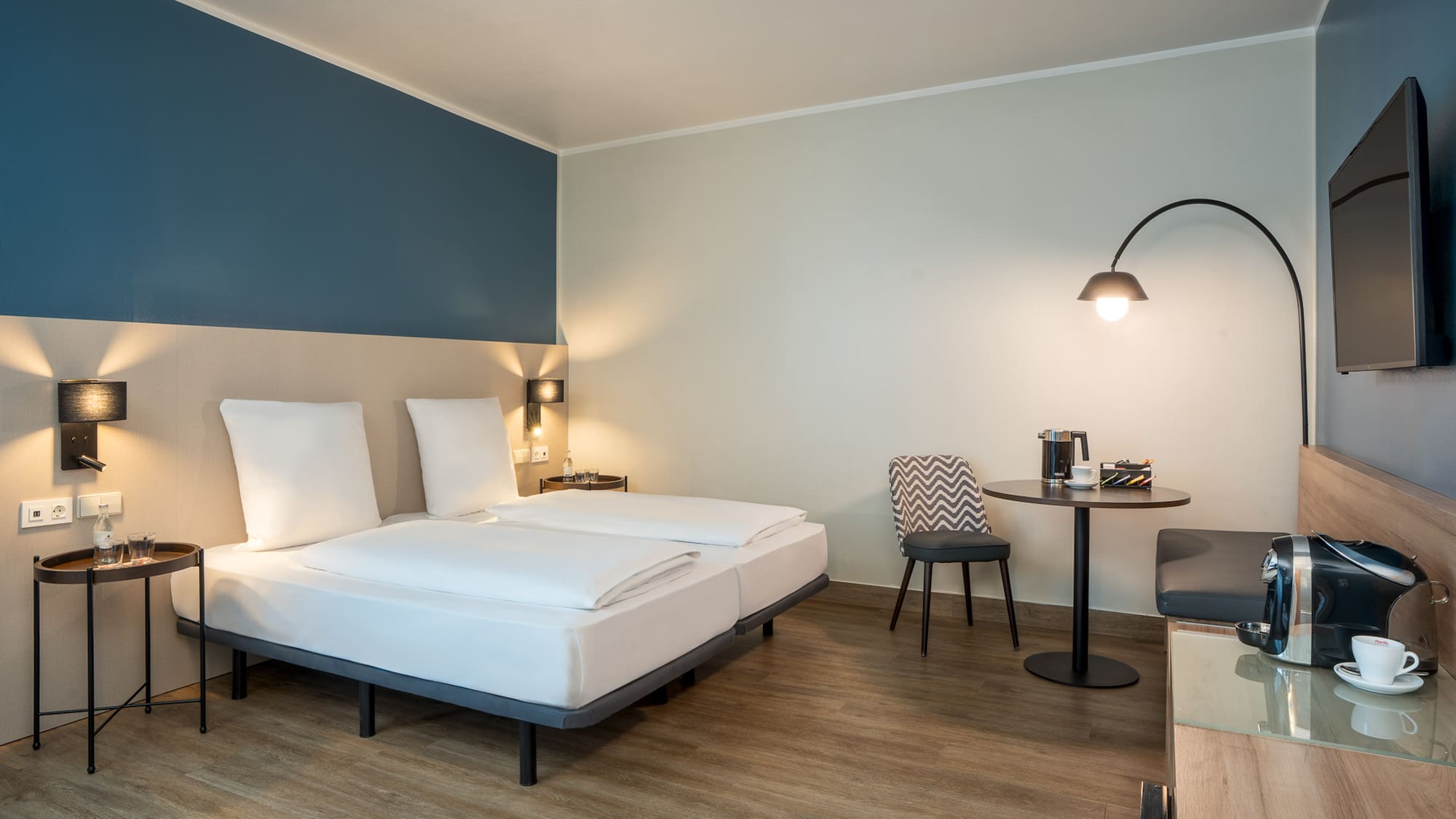 a room with a bed and a table