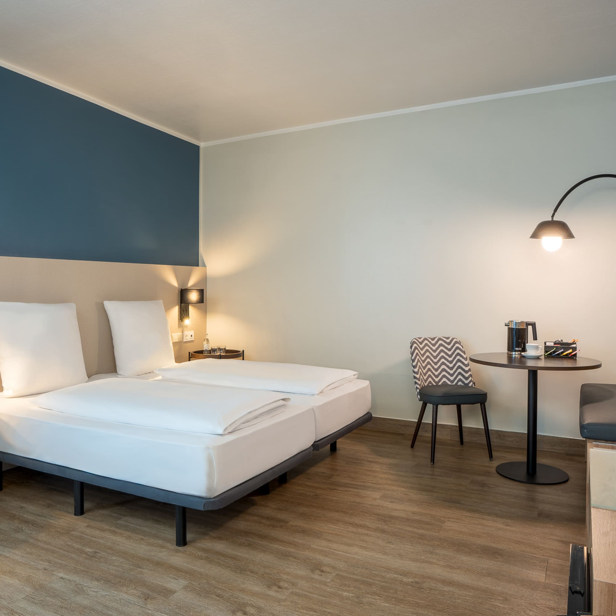 a room with a bed and a table