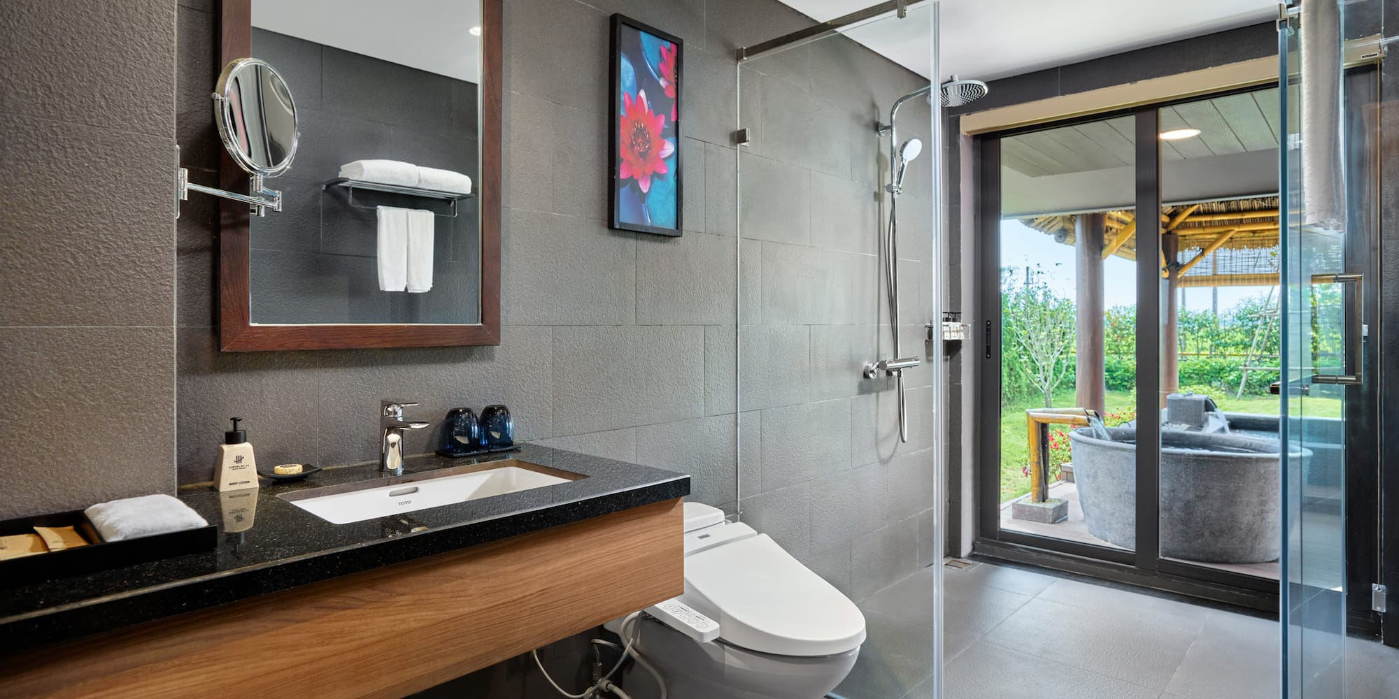 a bathroom with a shower and a toilet